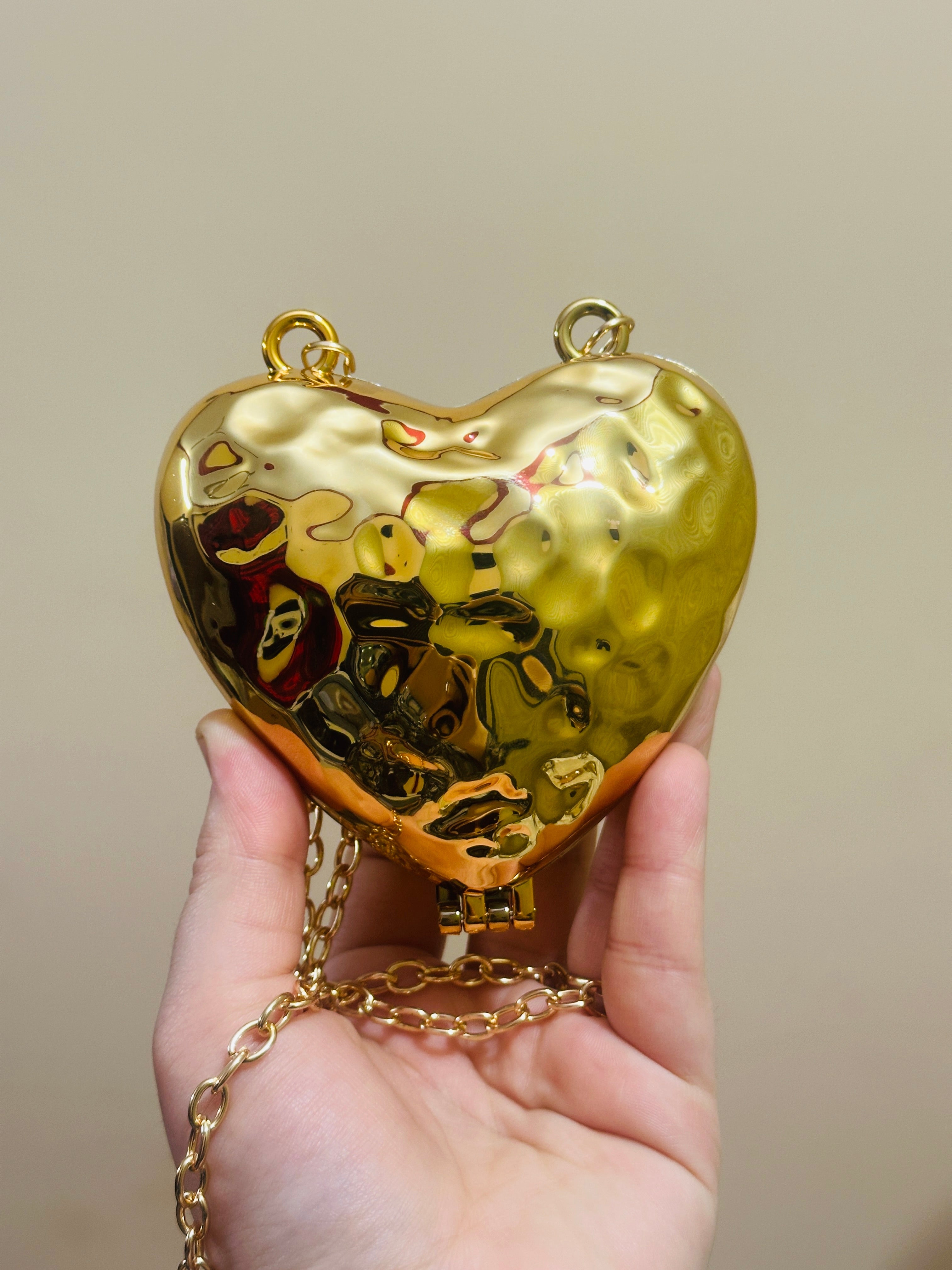 Heart golden clutch marbal